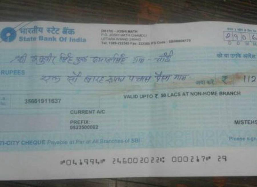 140 rupee cheqe distribution for disaster in chai village